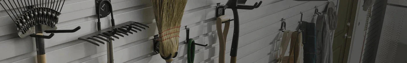 Items hanging on a Gladiator® garage wall organization system.