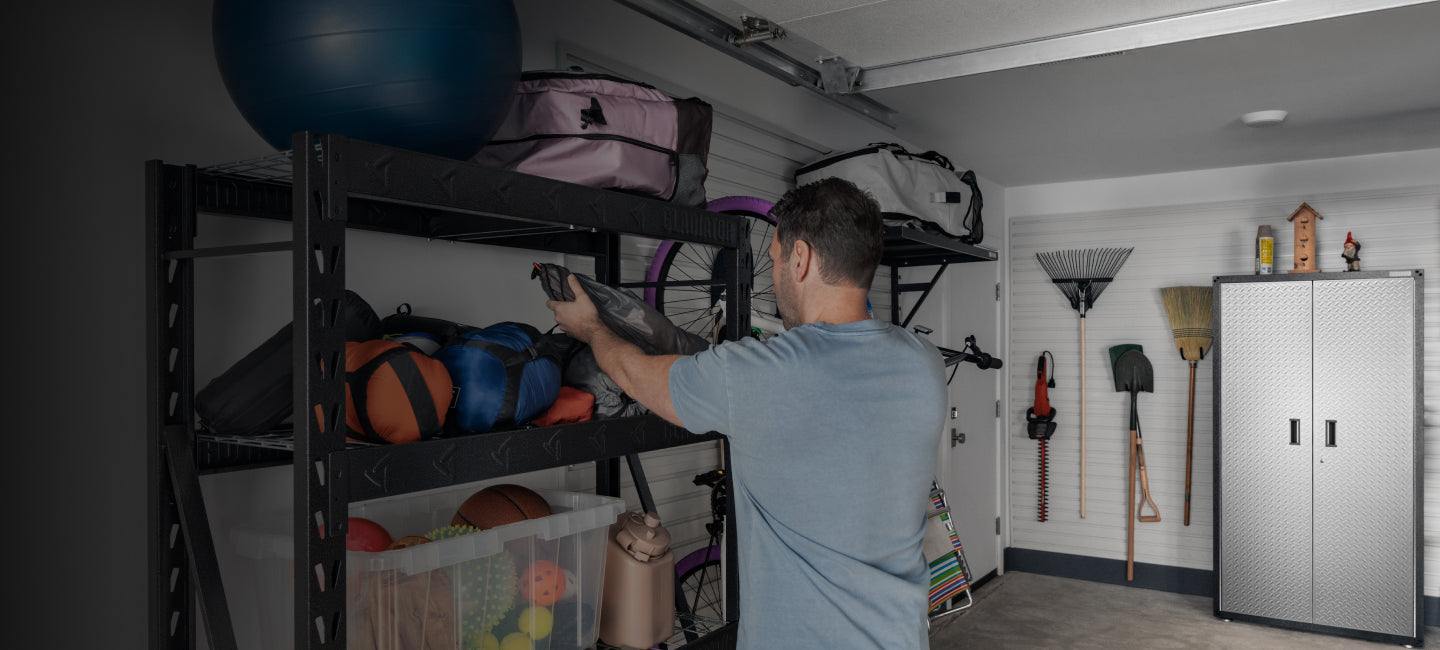 A person grabbing an item off a Gladiator® rack shelf