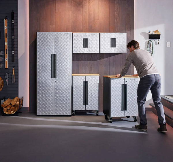 Person assembling GLADIATOR® cabinet system.