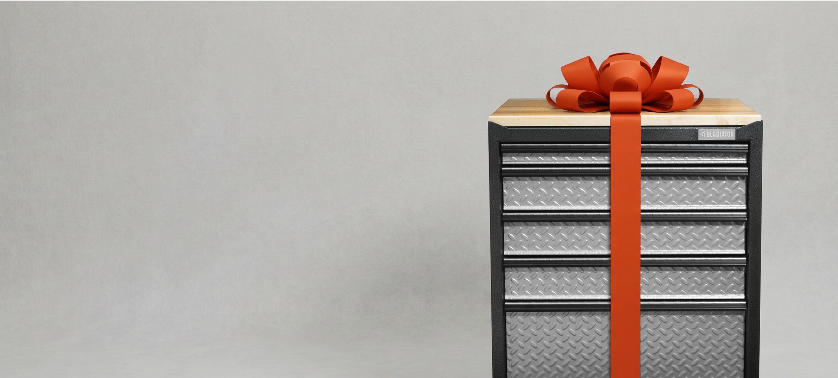 A Gladiator® GearDrawer with an orange bow