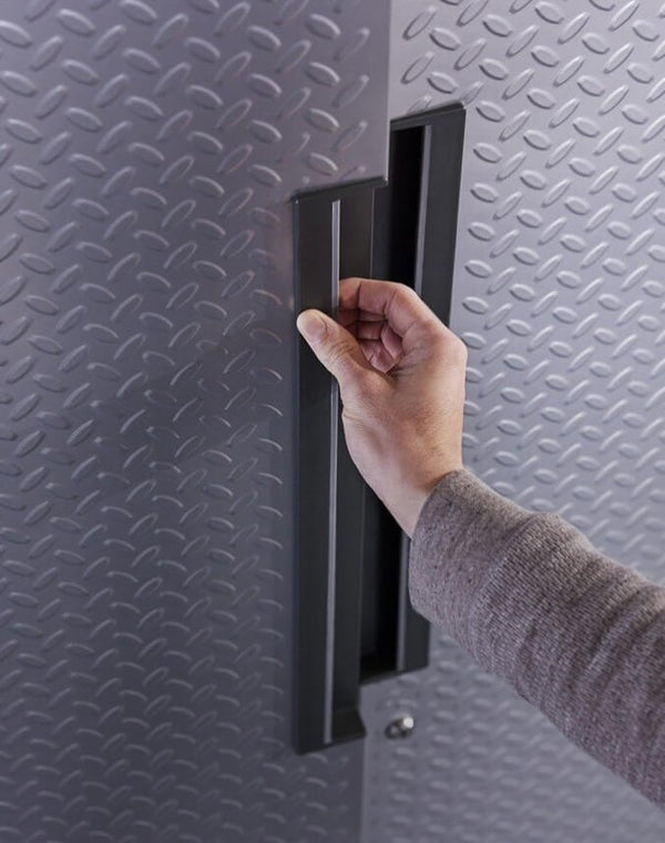 Soft touch, recessed handles on cabinet.